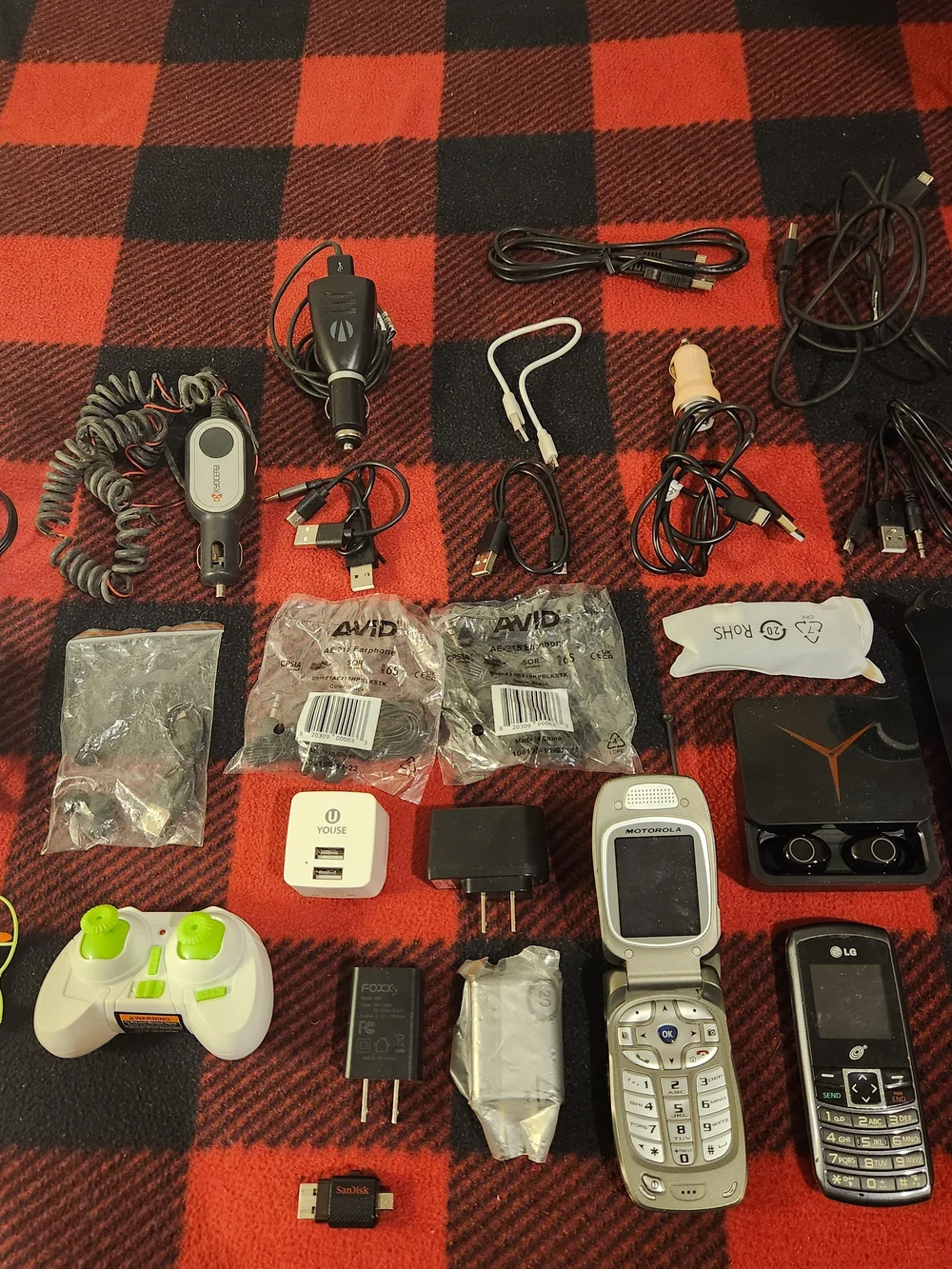 Elctronics Lot, Cellphones, Charging Cords, Remotes, And More